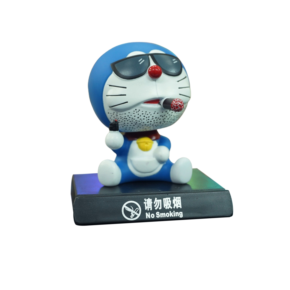 Mô hình Doraemon lắc đầu ngậm thuốc 